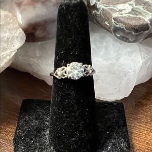 New. Stainless Steel adjustable Light Blue Moissanite Ring